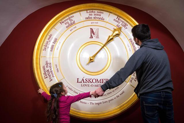 Visitors interact with the Love-o-meter, an interactive exhibition which expresses the strength of one's love. (AFP) Visitors interact with the Love-o-meter, an interactive exhibition which expresses the strength of one's love. (AFP)