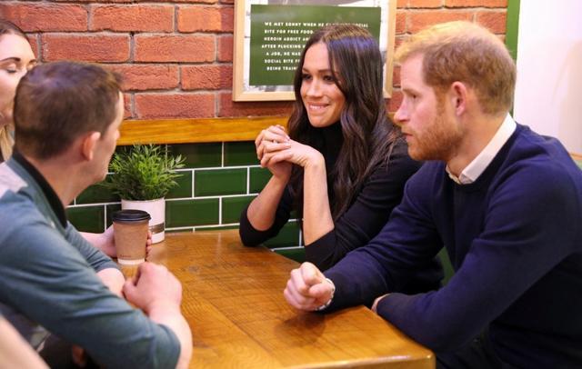 Meghan Markle and Britain's Prince Harry visit a cafe and social business called Social Bite in Edinburgh. (REUTERS) Meghan Markle and Britain's Prince Harry visit a cafe and social business called Social Bite in Edinburgh. (REUTERS)