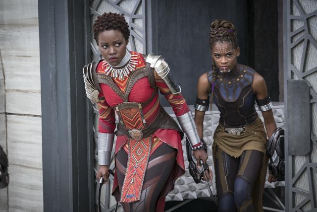 This image released by Disney shows Lupita Nyong'o, left, and Letitia Wright in a scene from Marvel Studios' Black Panther. (AP)