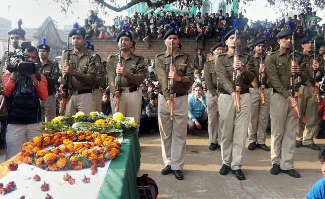 CRPF personnel pay gun salute to constable Mujahid Khan, who was killed in the terrorist attack at a CRPF camp in Srinagar, at Piro in Bhojpur district of Bihar on Wednesday. (PTI Photo) CRPF personnel pay gun salute to constable Mujahid Khan, who was killed in the terrorist attack at a CRPF camp in Srinagar, at Piro in Bhojpur district of Bihar on Wednesday. (PTI Photo)