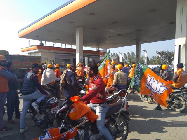 Bikers lined up for free fuel at a petrol pump in Karnal on Thursday. (HT Photo)