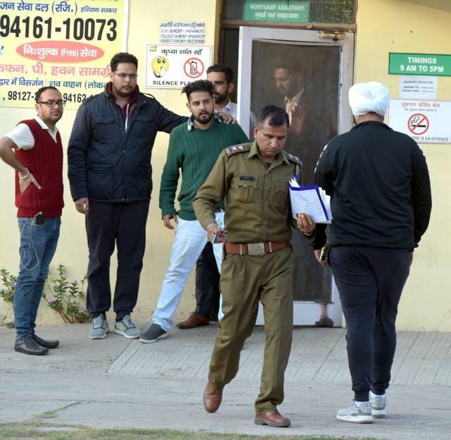 Puneet Kaur’s family members outside the mortuary in General Hospital, Sector 6, Panchkula, on Wednesday. The victim’s autopsy will be conducted today. (Sant Arora/HT ) Puneet Kaur’s family members outside the mortuary in General Hospital, Sector 6, Panchkula, on Wednesday. The victim’s autopsy will be conducted today. (Sant Arora/HT )