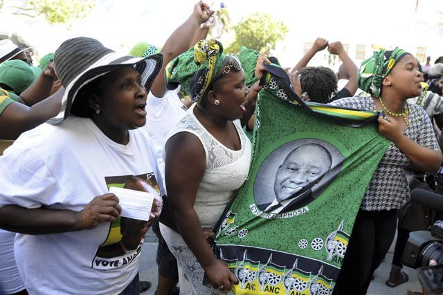 Supporters for president elect Cyril Ramaphosa, portrait on cloth, sing and dance outside parliament in Cape Town. Ramaphosa on Thursday was elected as South Africa's new president. (AP) Supporters for president elect Cyril Ramaphosa, portrait on cloth, sing and dance outside parliament in Cape Town. Ramaphosa on Thursday was elected as South Africa's new president. (AP)