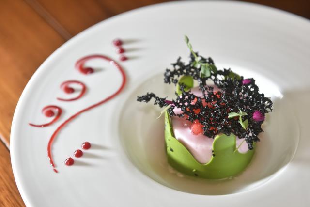The pastel pink tub tim krob panacotta that sits on a pristine white tender coconut ice cream base inside a bright green pastry shell looks like it’s been plucked from Monginis. It is sweet and not much else. (Aalok Soni/HT Photo)