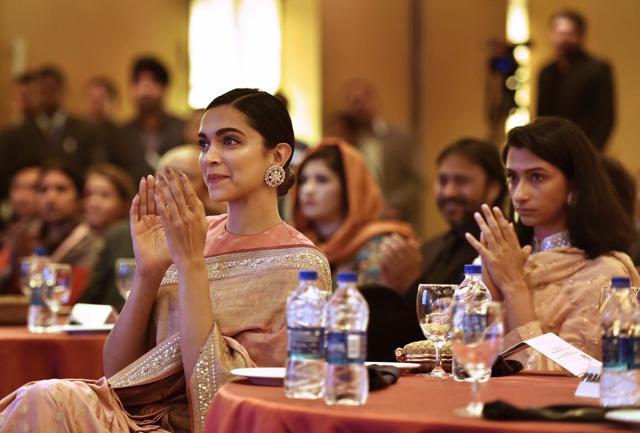 Deepika Padukone and her sister Anisha cheering on their father. (PTI) Deepika Padukone and her sister Anisha cheering on their father. (PTI)