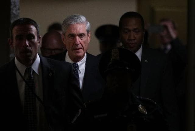 Special counsel Robert Mueller (2nd left) leaves after a closed meeting with members of the Senate Judiciary Committee at the Capitol in Washington, DC. (AFP File Photo)