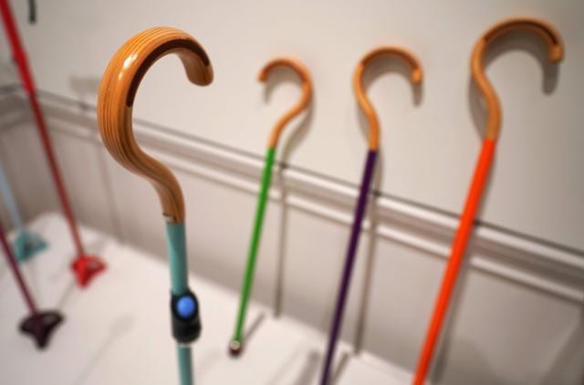 A bunch of walking canes on display. (AFP)