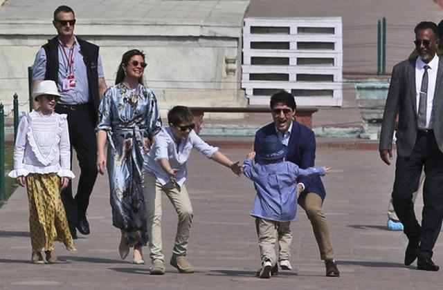 Canadian Prime Minister Justin Trudeau, plays with his son Hadrien as his wife, Sophie Gregoire Trudeau, second left, daughter, daughter Ella-Grace, left, and son Xavier watch during their visit to the Taj Mahal, in Agra, India, Sunday, Feb. 18, 2018. (AP) Canadian Prime Minister Justin Trudeau, plays with his son Hadrien as his wife, Sophie Gregoire Trudeau, second left, daughter, daughter Ella-Grace, left, and son Xavier watch during their visit to the Taj Mahal, in Agra, India, Sunday, Feb. 18, 2018. (AP)