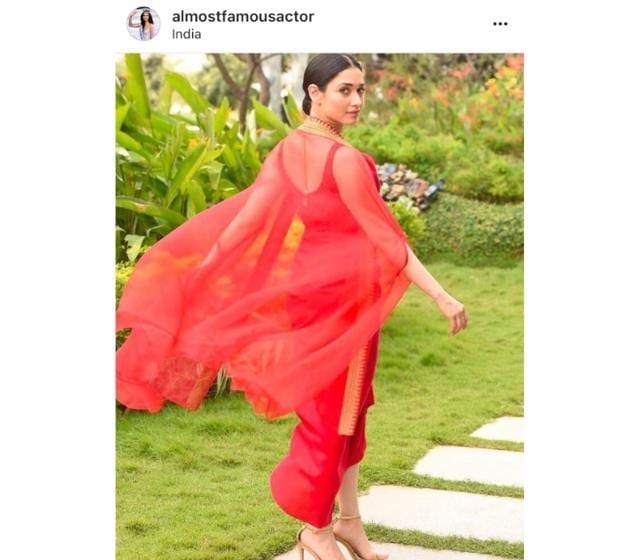 Tamannaah is ensemble included a silk organza cape worn over her shoulders with a silk draped dress. (Instagram/ almostfamousactor) Tamannaah is ensemble included a silk organza cape worn over her shoulders with a silk draped dress. (Instagram/ almostfamousactor)