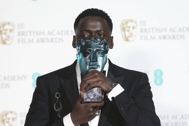 Actor Daniel Kaluuya poses with his Rising Star award for 'Get Out' backstage at the BAFTA 2018 Awards. (Joel C Ryan/Invision/AP) Actor Daniel Kaluuya poses with his Rising Star award for 'Get Out' backstage at the BAFTA 2018 Awards. (Joel C Ryan/Invision/AP)