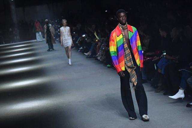 Models present creations from the Burberry collection. (AFP/ Ben Stansall)