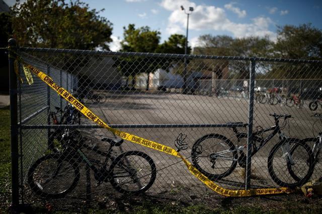 The bicycles that were left behind are seen at the Marjory Stoneman Douglas High School, after the police security perimeter was removed, following a mass shooting in Parkland. (REUTERS) The bicycles that were left behind are seen at the Marjory Stoneman Douglas High School, after the police security perimeter was removed, following a mass shooting in Parkland. (REUTERS)