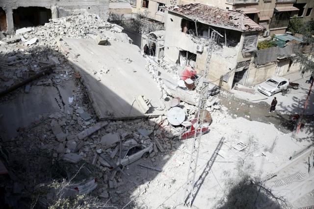 A general view of damaged houses after an air raid in the besieged town of Douma in eastern Ghouta in Damascus, Syria. (Reuters Photo) A general view of damaged houses after an air raid in the besieged town of Douma in eastern Ghouta in Damascus, Syria. (Reuters Photo)