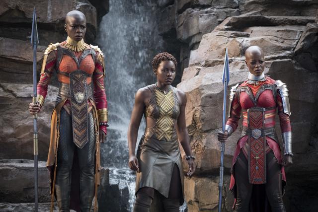 This image released by Disney -Marvel Studios shows, from left, Danai Gurira, Lupita Nyong'o and Florence Kasumba in a scene from Black Panther. (AP) This image released by Disney -Marvel Studios shows, from left, Danai Gurira, Lupita Nyong'o and Florence Kasumba in a scene from Black Panther. (AP)