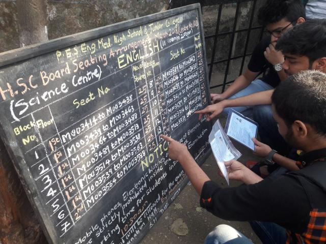 Students check their exam rooms at a centre in Thane on Wednesday morning. (Praful Gangurde) Students check their exam rooms at a centre in Thane on Wednesday morning. (Praful Gangurde)