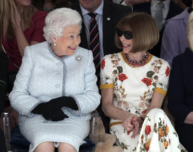 Queen Elizabeth sits next to fashion editor Anna Wintour. (AP) Queen Elizabeth sits next to fashion editor Anna Wintour. (AP)