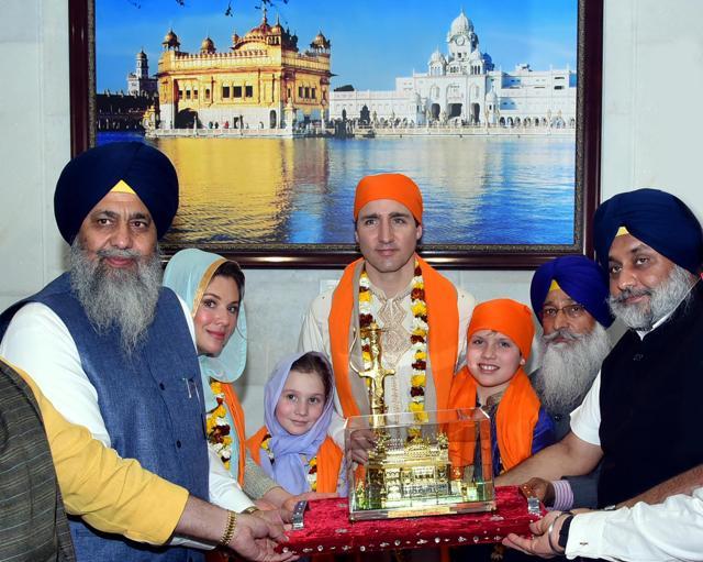 SGPC president Gobind Singh Longowal (L), SAD president Sukhbir Singh Badal (R), and SGPC chief secretary Roop Singh (2R) present a replica of the Golden Temple to the Trudeau family. (HT Photo) SGPC president Gobind Singh Longowal (L), SAD president Sukhbir Singh Badal (R), and SGPC chief secretary Roop Singh (2R) present a replica of the Golden Temple to the Trudeau family. (HT Photo)