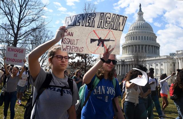Hundreds of high school and middle school students from the District of Columbia, Maryland and Virginia staged walkouts and gather in front of the Capitol in support of gun control. (AFP Photo)