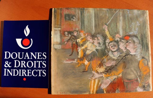 The pastel, depicting a line of men singing in the opera Don Juan, was stolen nine years ago from a museum in Marseille. (AFP PHOTO / Douanes Francaises )