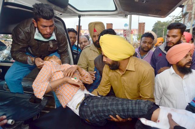 One of the injured Lovepreet Singh, 13, being shifted to a hospital in Amritsar on Saturday. (Sameer Sehgal/HT) One of the injured Lovepreet Singh, 13, being shifted to a hospital in Amritsar on Saturday. (Sameer Sehgal/HT)