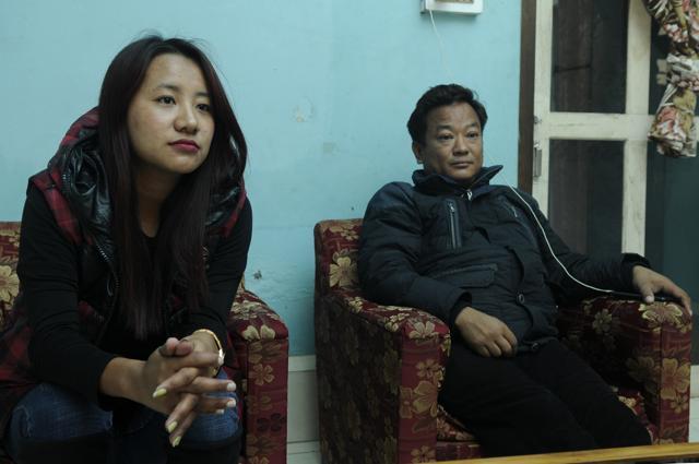 Wedie U Kronu , a National People’s Party candidate for the Dimapur III seat, outlines her agenda that will focus on youth and development. Next to her is her husband Roland Lotha. (Samir Jana/HT PHOTO)