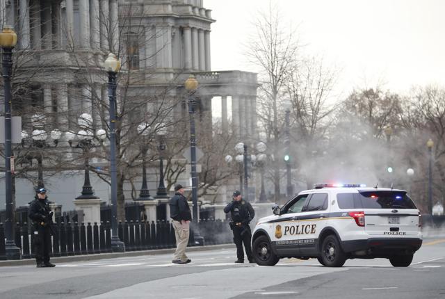 Police block 17th Street near the White House in Washington. (AP Photo) Police block 17th Street near the White House in Washington. (AP Photo)