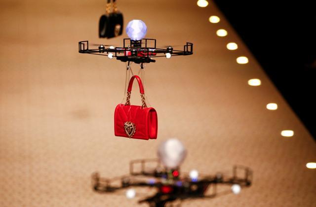 Drones carry bags, the creations from the Dolce &amp; Gabbana Autumn/Winter 2018 women's collection during Milan Fashion Week in Milan, Italy. (REUTERS)