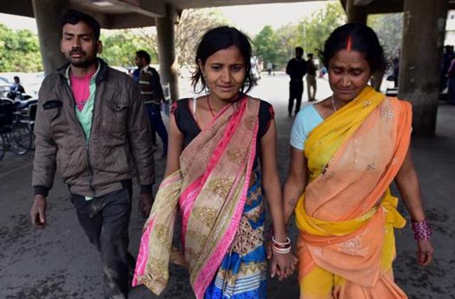 Family members of five-year-old victim Ujala at the Government Medical College and Hospital, Sector 32, Chandigarh, on Monday. (HT Photo)