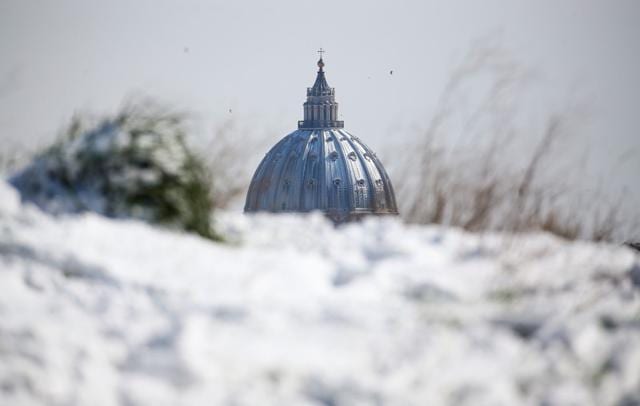 Saint Peter's Basilica dome is seen from afar after a heavy snowfall, in Rome. (Reuters Photo) Saint Peter's Basilica dome is seen from afar after a heavy snowfall, in Rome. (Reuters Photo)