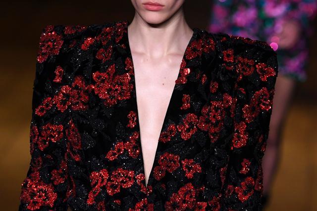 A model presents a creation for Saint Laurent during the 2018/2019 Fall/Winter collection. (AFP)