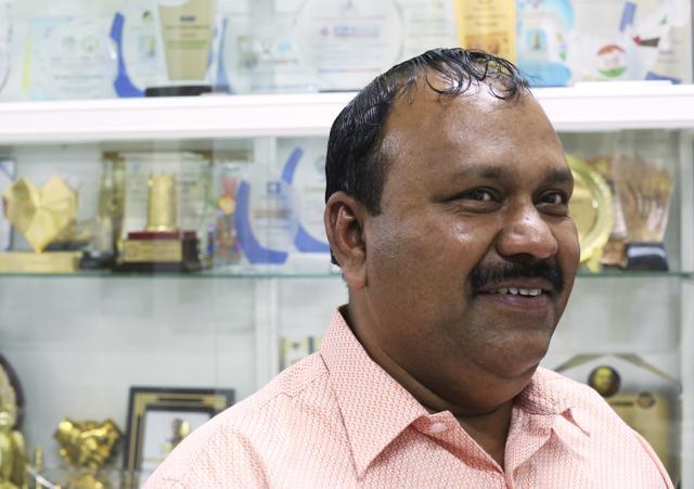 In this Tuesday, Feb. 27, 2018 photograph, Ashraf "Sherry" Thamarassery, who volunteers his time helping repatriate the dead from the United Arab Emirates, speaks to The Associated Press in his home in Ajman, United Arab Emirates. (AP) In this Tuesday, Feb. 27, 2018 photograph, Ashraf "Sherry" Thamarassery, who volunteers his time helping repatriate the dead from the United Arab Emirates, speaks to The Associated Press in his home in Ajman, United Arab Emirates. (AP)