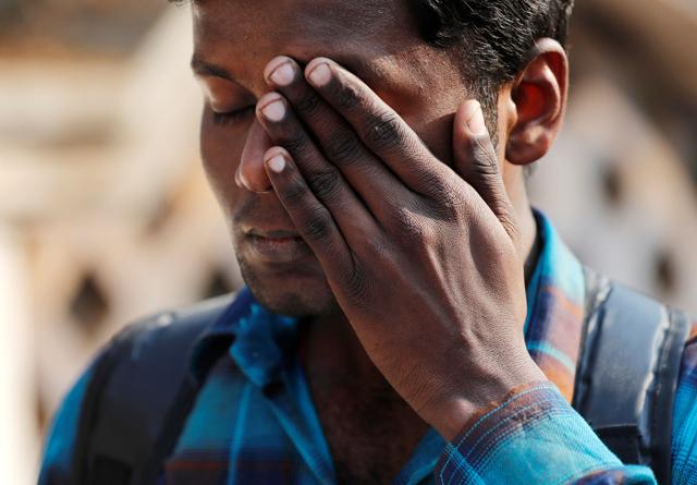 A fan of Sridevi reacts as waits to offer his condolences outside a makeshift memorial in Mumbai. (REUTERS) A fan of Sridevi reacts as waits to offer his condolences outside a makeshift memorial in Mumbai. (REUTERS)