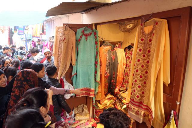 Suits on display at one of the small shops in the Inderlok Thursday market. (Manoj Verma/HT Photo)