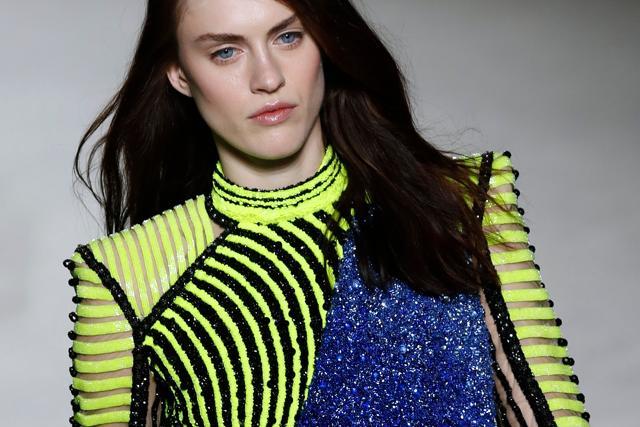 A model presents a creation for Balmain during the 2018/2019 fall/winter collection fashion show. (AFP PHOTO / FRANCOIS GUILLOT) A model presents a creation for Balmain during the 2018/2019 fall/winter collection fashion show. (AFP PHOTO / FRANCOIS GUILLOT)