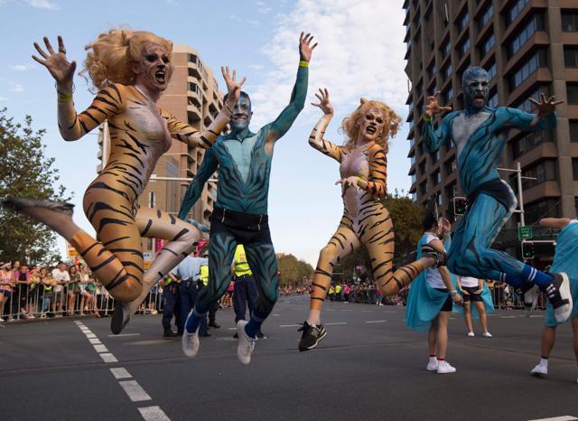 Participants in costumes at the parade. (AFP/Saeed Khan) Participants in costumes at the parade. (AFP/Saeed Khan)