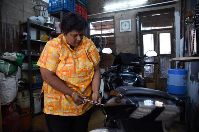 Deepali Vijay Dharmadhikari, mechanic and owner of Shakti Auto garage. (Sanket Wankhade/HT PHOTO)