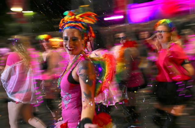 Participants dance during the 40th anniversary of the Sydney Gay and Lesbian Mardi Gras Parade. (REUTERS/Steven Saphore) Participants dance during the 40th anniversary of the Sydney Gay and Lesbian Mardi Gras Parade. (REUTERS/Steven Saphore)