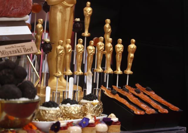 Celebrity chef Wolfgang Puck's food creations for the Oscars are shown off on the Red Carpet. (REUTERS)