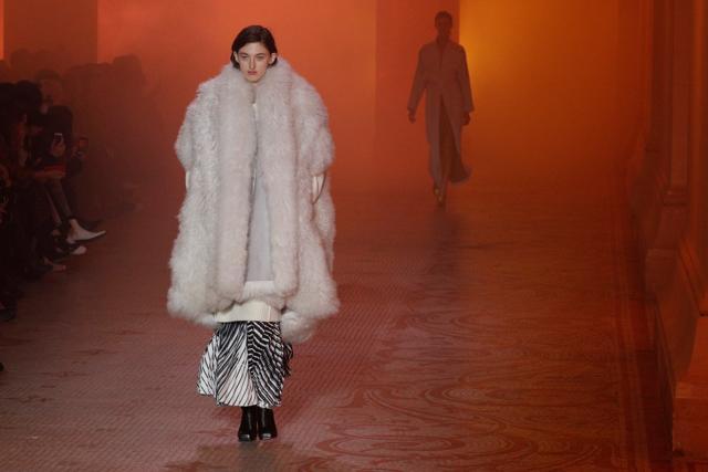 A model presents a creation by designer Yiqing Yin as part of her Autumn/Winter 2018/2019 women's ready-to-wear collection for fashion house Paul Poiret, during Fashion Week in Paris. (REUTERS) A model presents a creation by designer Yiqing Yin as part of her Autumn/Winter 2018/2019 women's ready-to-wear collection for fashion house Paul Poiret, during Fashion Week in Paris. (REUTERS)