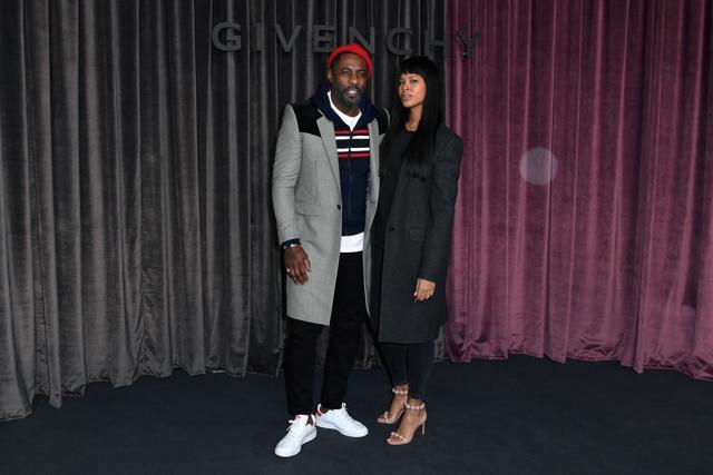 British actor and producer Idris Elba and Sabrina Dowhre pose during the photocall of Givenchy before the women's 2018/2019 fall/winter collection fashion show. (AFP) British actor and producer Idris Elba and Sabrina Dowhre pose during the photocall of Givenchy before the women's 2018/2019 fall/winter collection fashion show. (AFP)