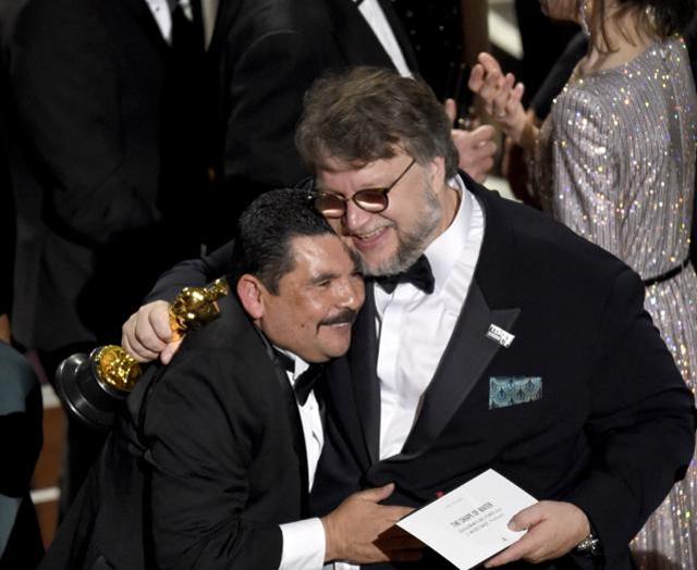 Guillermo del Toro, right, winner of the award for best picture for The Shape of Water celebrates with Guillermo Rodriguez from Jimmy Kimmel Live! at the Oscars. (Chris Pizzello/Invision/AP) Guillermo del Toro, right, winner of the award for best picture for The Shape of Water celebrates with Guillermo Rodriguez from Jimmy Kimmel Live! at the Oscars. (Chris Pizzello/Invision/AP)