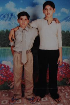 A 2006 photo of Akash Yadav (right) with his brother Sumit. (Parveen Kumar/HT Photo)