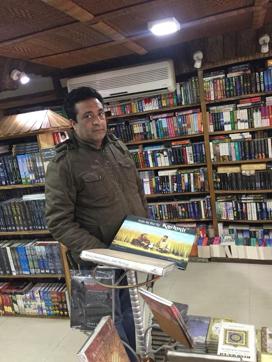 Sheikh Ajaz Ahmad, the owner, poses with a book. (Pardeep Singh Dardi/ HT Photo) Sheikh Ajaz Ahmad, the owner, poses with a book. (Pardeep Singh Dardi/ HT Photo)