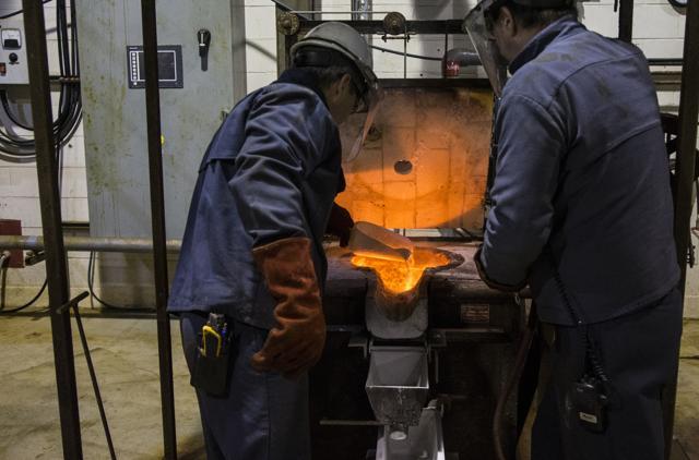 Workers prepare to make a magnesium ingot at Alliance Magnesium. (Christinne Muschi/ Bloomberg) Workers prepare to make a magnesium ingot at Alliance Magnesium. (Christinne Muschi/ Bloomberg)