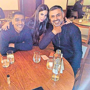 Ravi Krishnan (left) with Ayesha and Nikesh Arora.