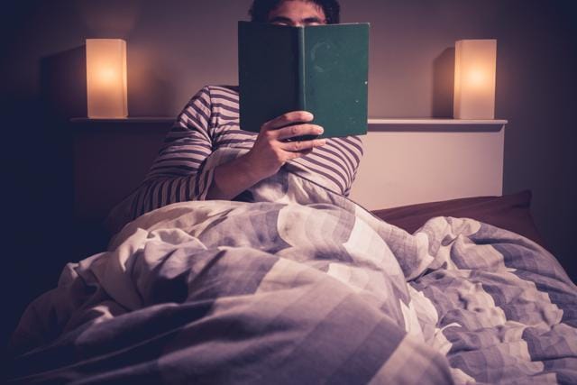 Instead of watching TV or spending time on your phone, tablet, or computer, choose another relaxing activity, such as reading a book or listening to soft music. (Shutterstock) Instead of watching TV or spending time on your phone, tablet, or computer, choose another relaxing activity, such as reading a book or listening to soft music. (Shutterstock)