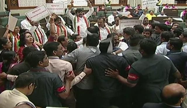 Congress MLAs protest during Telangana governor ESL Narasimhan’s address to the joint session of legislative assembly and legislative council. (ANI/Twitter) Congress MLAs protest during Telangana governor ESL Narasimhan’s address to the joint session of legislative assembly and legislative council. (ANI/Twitter)