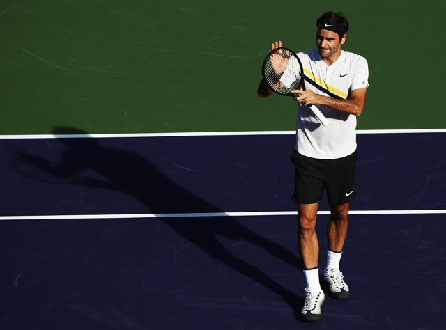 Roger Federer celebrates winning his match against Federico Delbonis. (AFP) Roger Federer celebrates winning his match against Federico Delbonis. (AFP)