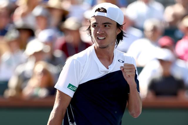 Taro Daniel celebrates a point against Novak Djokovic on Sunday. (AFP) Taro Daniel celebrates a point against Novak Djokovic on Sunday. (AFP)