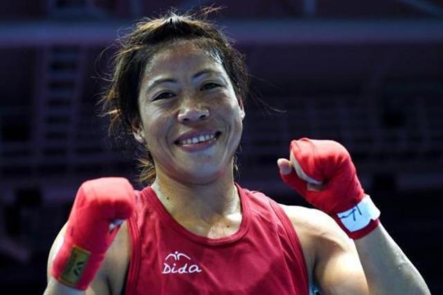 This file photo taken on October 01, 2014, shows Mary Kom reacting after being declared the winner of the women's flyweight (48-51kg) boxing final match against Kazakhstan's Shekerbekova Zhaina during the 2014 Asian Games at the Seonhak Gymnasium in Incheon. (AFP) This file photo taken on October 01, 2014, shows Mary Kom reacting after being declared the winner of the women's flyweight (48-51kg) boxing final match against Kazakhstan's Shekerbekova Zhaina during the 2014 Asian Games at the Seonhak Gymnasium in Incheon. (AFP)